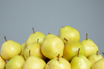 Pears on the grey isolated background