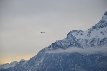 Fototapeta na wymiar Airplane and mountain.