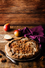 Pear galette cake with walnuts and cinnamon