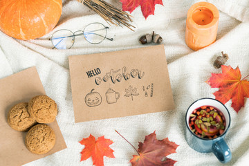 October background with leaves, food and drink, acorns, candle and eyeglasses