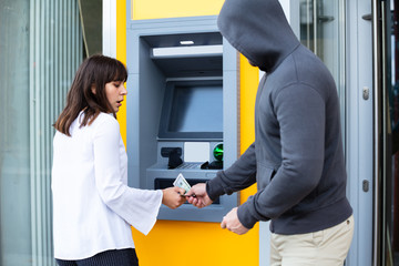 Shocked Woman Looking At Thief Stealing Her Money