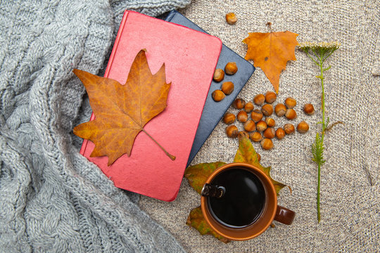 Autumn sentiment. Pictures of Autumn Coffee, Leaves, Books, Hazelnuts and Flowers.