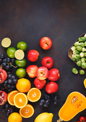 Variety of freshly harvested organic fruits and vegetables from the farmers market, dieting and nutrition concept.  Top view, flat lay