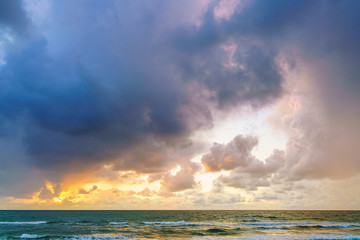 Beautiful seascape, nature landscape, beach side, waves movement,  with dramatic clouds and sky during sunrise or sunset.