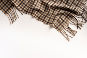 Warm scarf isolated on white background. Flat lay.