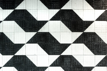 Close up detail of Sao Paulo street sidewalk. Made of cement in black and white colors these tiles...