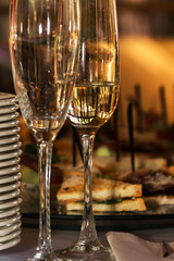 On the table are snacks and wine. Food for receptions. Catering