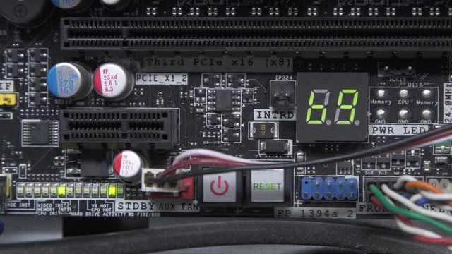 Start up  and Begin work hardware Computer PC. close up to Motherboard 2 Digit BIOS POST codes in hex during boot.