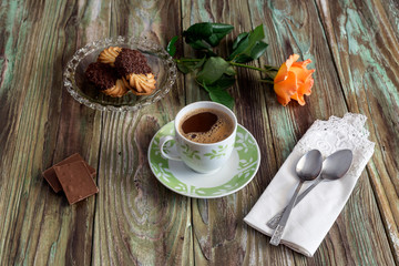 The brewed coffee, biscuits and chocolate