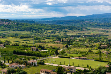 Fototapeta na wymiar Landscape with fruitful Luberon valley in Provence, South of France