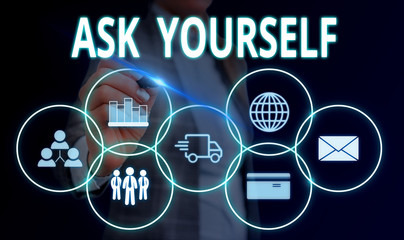 Handwriting text Ask Yourself. Conceptual photo Thinking the future Meaning and Purpose of Life Goals Woman wear formal work suit presenting presentation using smart device