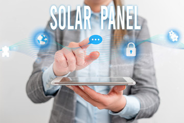 Handwriting text Solar Panel. Conceptual photo designed to absorb suns rays source of energy generating Female human wear formal work suit presenting presentation use smart device