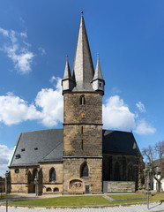 Fototapeta na wymiar Gothic city church with its bell tower in Lichtenfels, Germany 