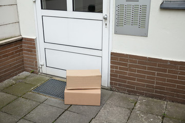 Delivery Of Parcel Boxes At Doorstep
