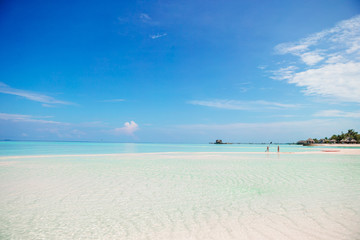 Fototapeta na wymiar Beautiful white sand beach and turquoise clean water