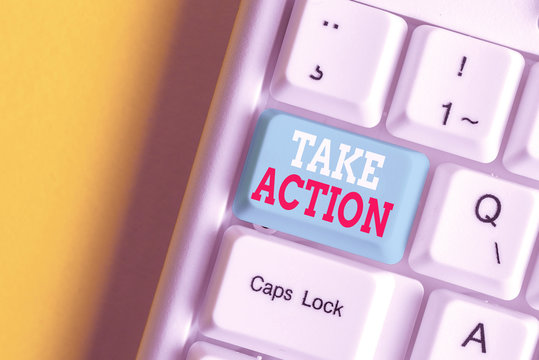 Writing Note Showing Take Action. Business Concept For Advices Someone To Do Something Or Reaction Right Now White Pc Keyboard With Note Paper Above The White Background