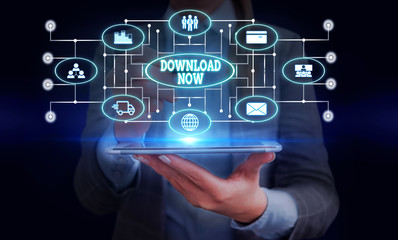 Obraz premium Conceptual hand writing showing Download Now. Concept meaning To copy or move programs or information into another device Woman wear work suit presenting presentation smart device