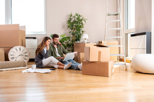 Two lovebirds making a break in their new apartment