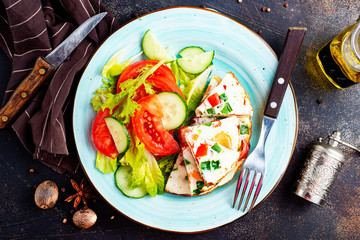 omelette with vegetables on white plate