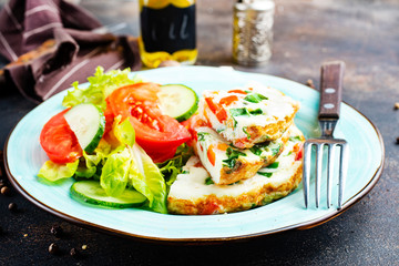 omelette with vegetables on white plate