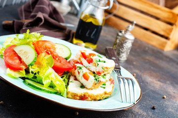 omelette with vegetables on white plate