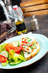 omelette with vegetables on white plate