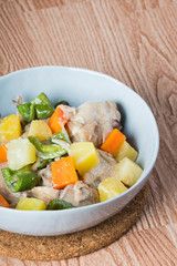 chicken pineapple coconut stew with green bell pepper and carrots