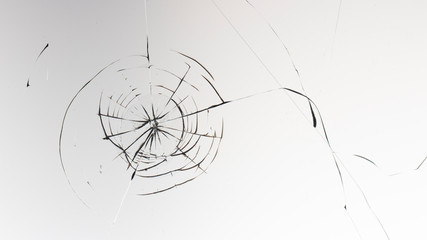 Cracked glass on a white background texture