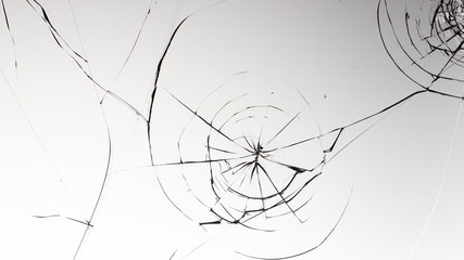 Cracked glass on a white background texture