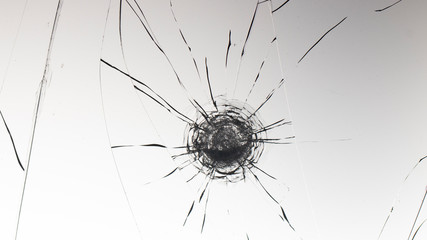 Cracked glass on a white background texture