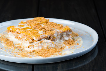 mango float, a well known easy to prepare Filipino dessert consist of cream, condensed milk, mango and graham crackers