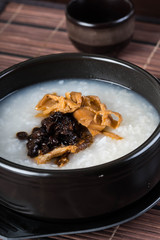 plain porridge with dried soy bean fish and marinated bamboo shoots