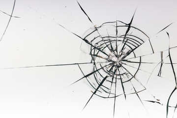 Cracked glass on a white background texture