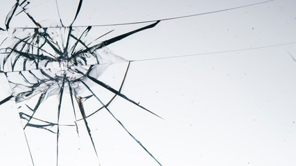 Cracked glass on a white background texture