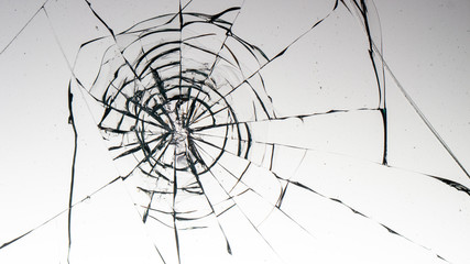 Cracked glass on a white background texture