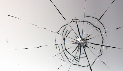 Cracked glass on a white background texture