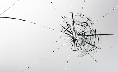 Cracked glass on a white background texture