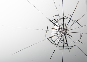 Cracked glass on a white background texture