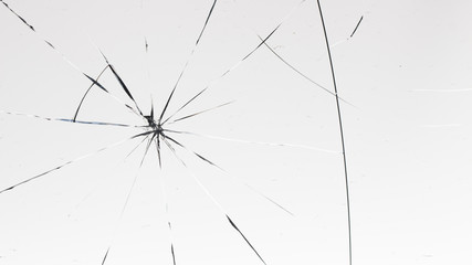 Cracked glass on a white background texture