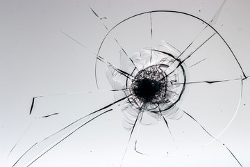 Cracked glass on a white background texture