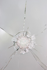 Cracked glass on a white background texture