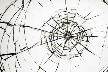 Cracked glass on a white background texture