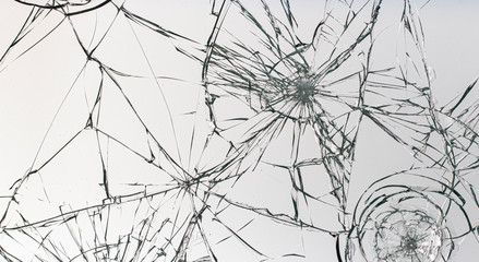 Cracked glass on a white background texture