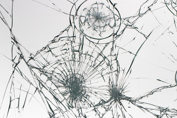 Obraz premium Cracked glass on a white background texture