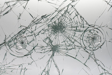 Cracked glass on a white background texture