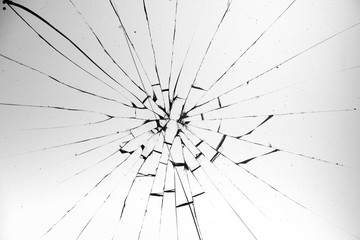 Cracked glass on a white background texture