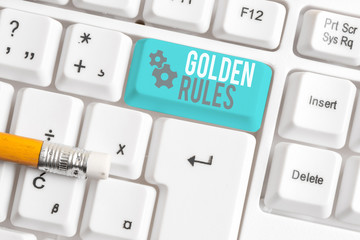 Writing note showing Golden Rules. Business concept for Basic principle that should be followed...