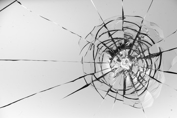 Cracked glass on a white background texture