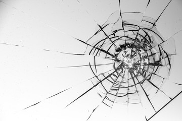 Cracked glass on a white background texture