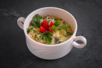 Healthy breakfast. Risotto with seafood and cheese baked in the oven